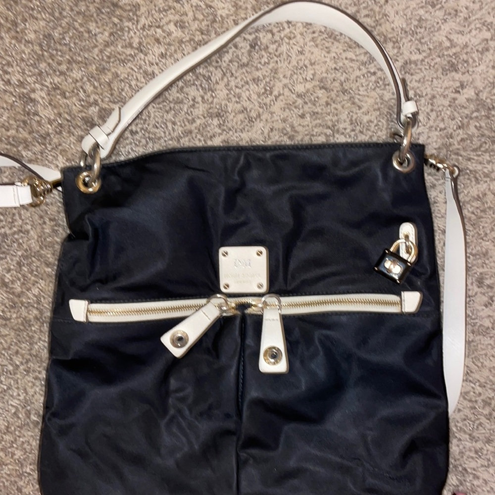Ladies Henri Bendel crossbody, shoulder bag, nice condition, smoke free home.